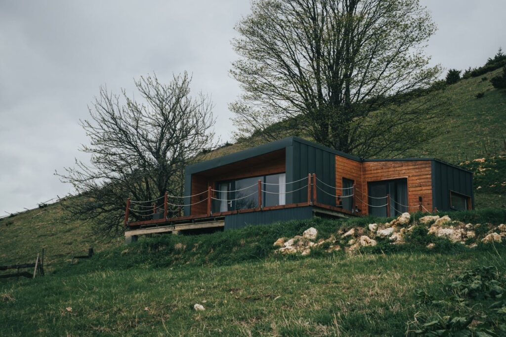 A modern house set in the picturesque rural landscape of Fundata, Romania.